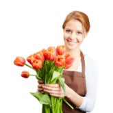 Uw bloemist gaat voor u aan het werk.